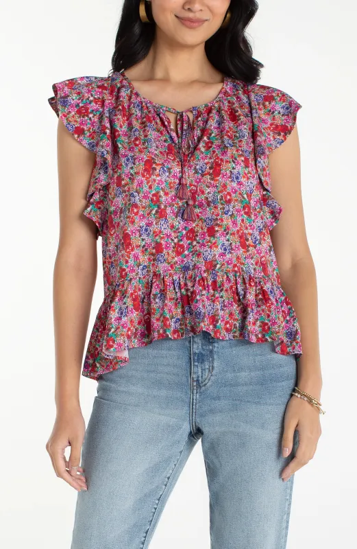 PETITE FLUTTER SLEEVE PEPLUM WOVEN TOP W/ TIES made by Liverpool Jeans Company