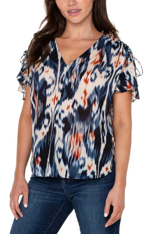 SHIRRED V-NECK TOP WITH TIE DETAILS sold by Liverpool Jeans Company
