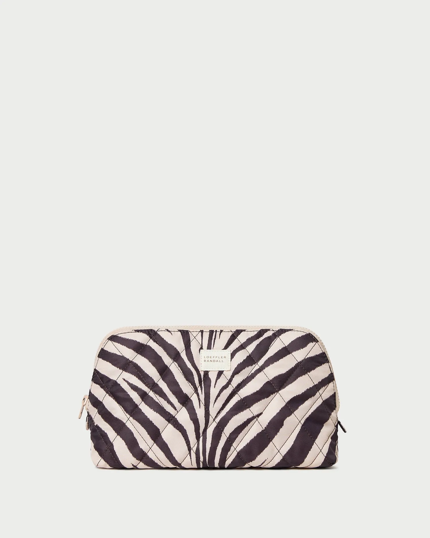 Frances Zebra Cosmetic Pouch sold by Loeffler Randall