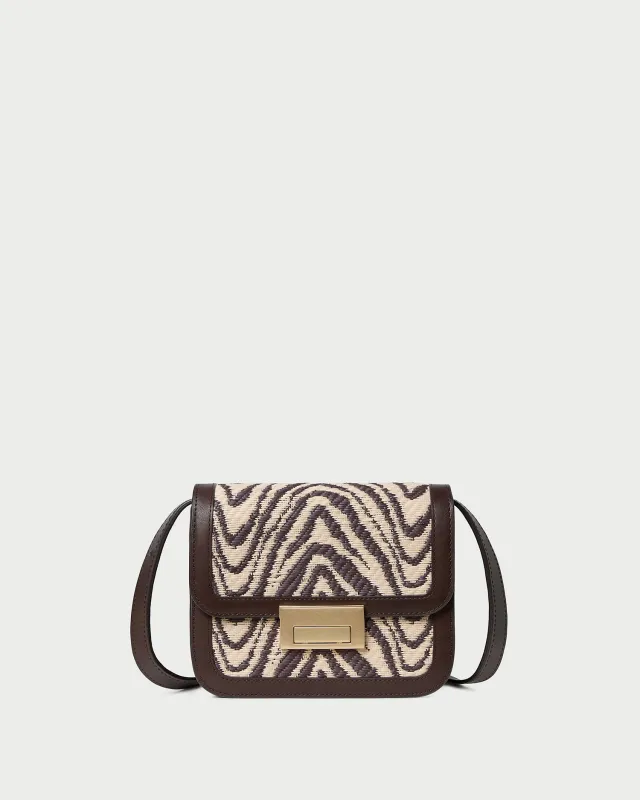Desi Zebra Straw Crossbody sold by Loeffler Randall