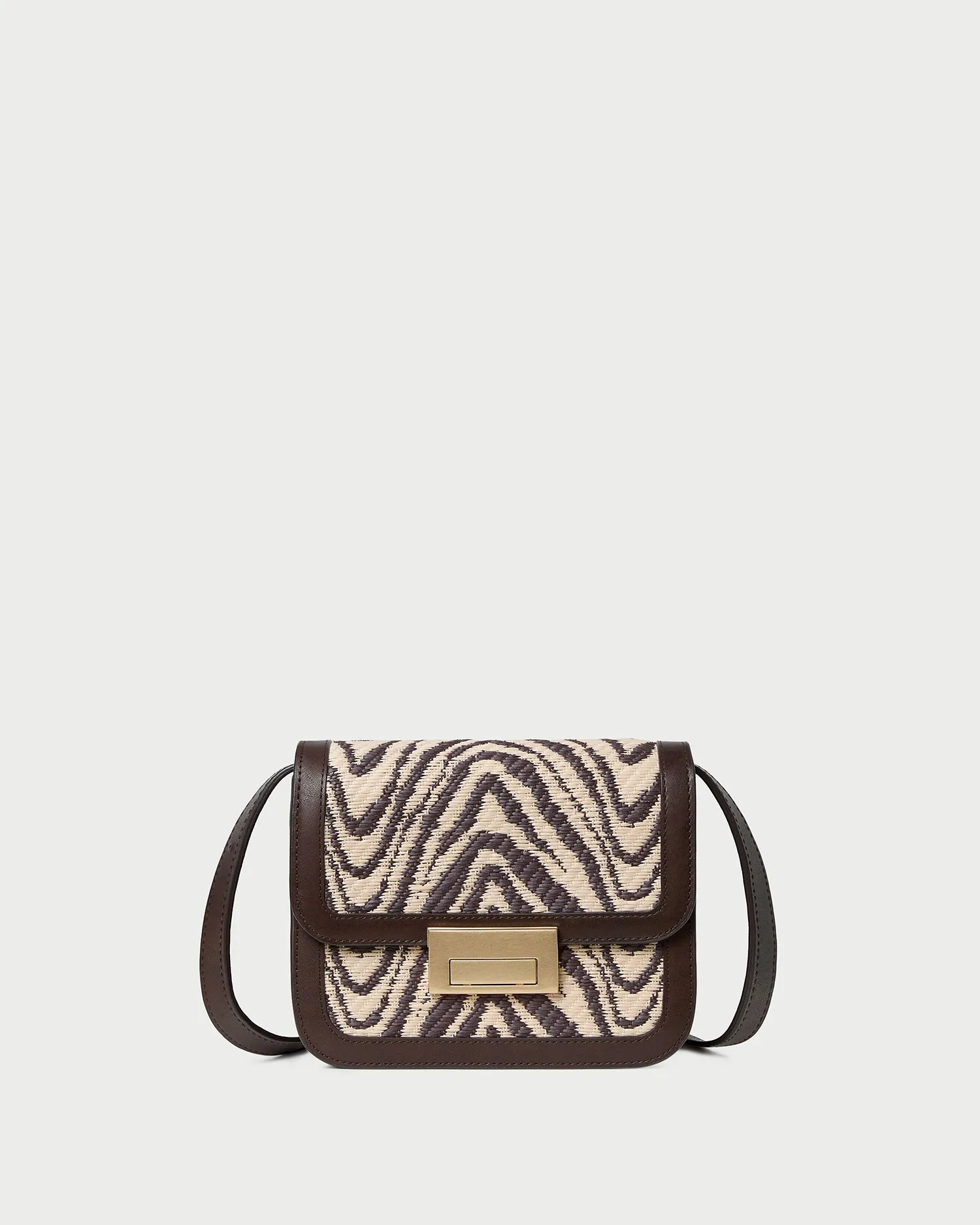 Desi Zebra Straw Crossbody sold by Loeffler Randall