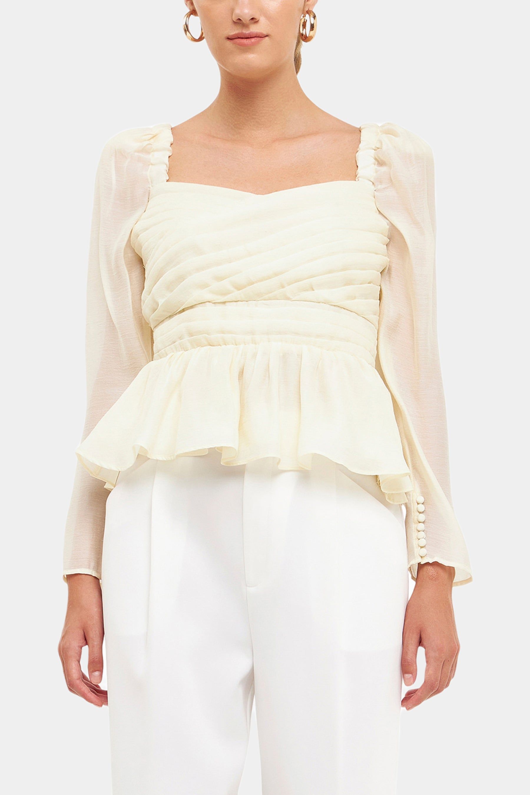 Pleated Peplum Top sold by Lord & Taylor