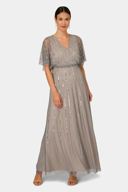 Flutter Sleeve Surplice Blouson Beaded Gown sold by Lord & Taylor