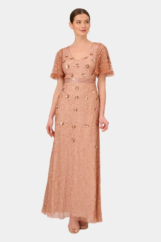 Beaded Flutter Sleeve Gown sold by Lord & Taylor