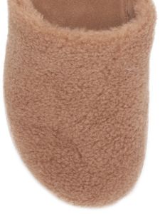 Casey Shearling Mules sold by Lord & Taylor