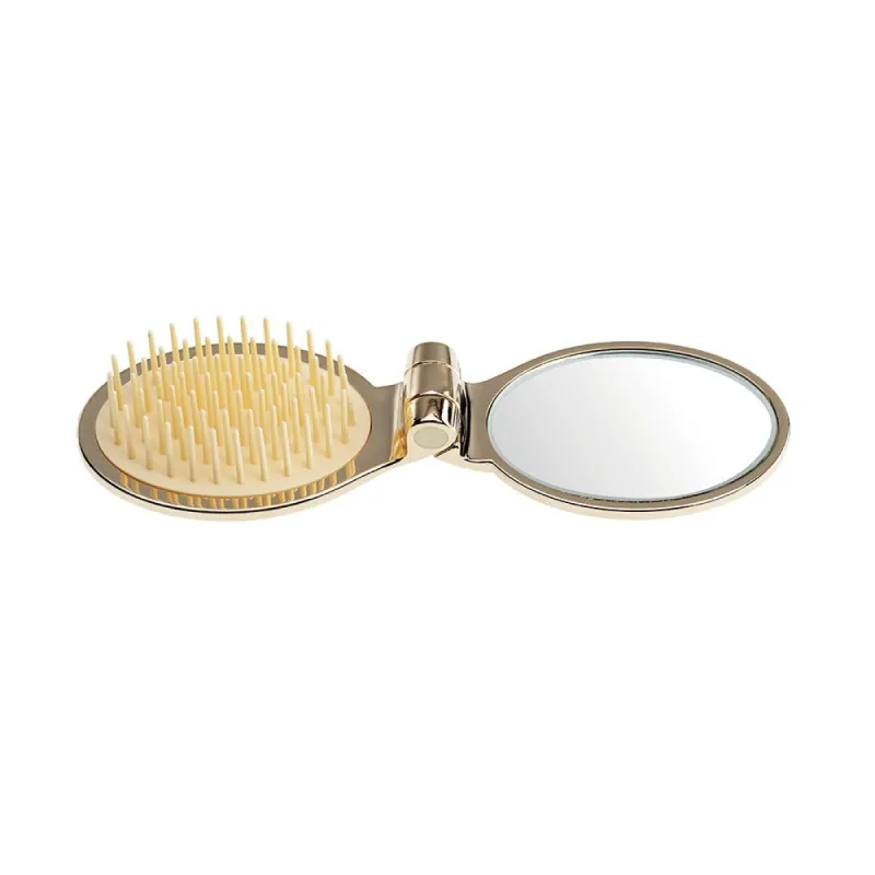 Folding Travel Brush and Mirror sold by Lord & Taylor