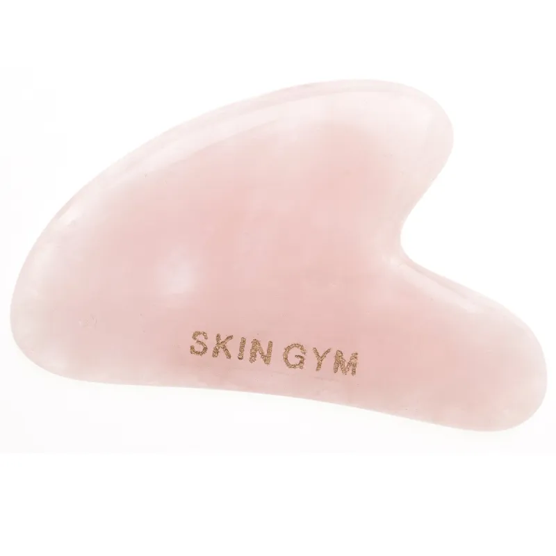 Rose Quartz Heart Sculpty Gua Sha sold by Lord & Taylor