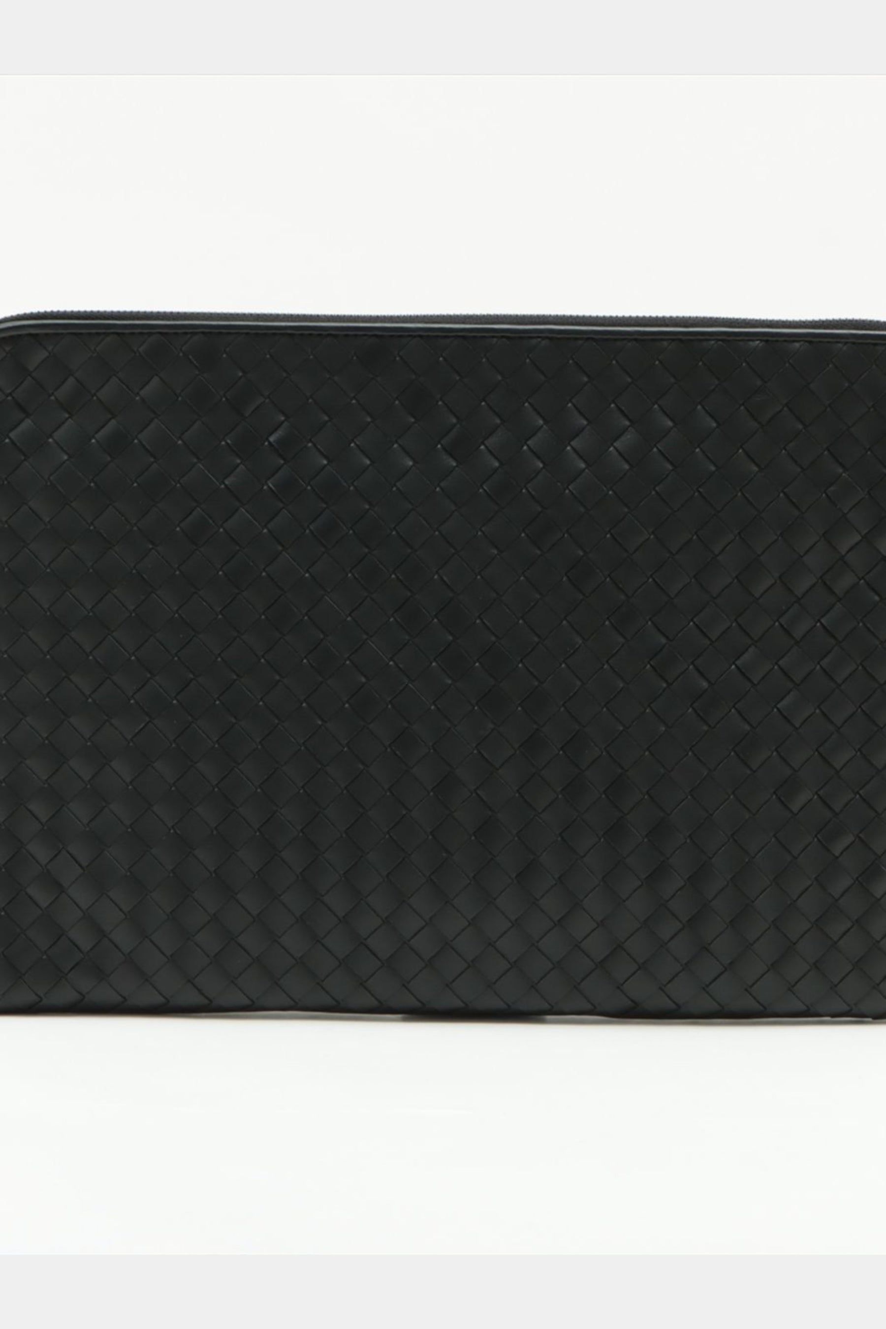 Intrecciato Leather Clutch Bag sold by Lord & Taylor