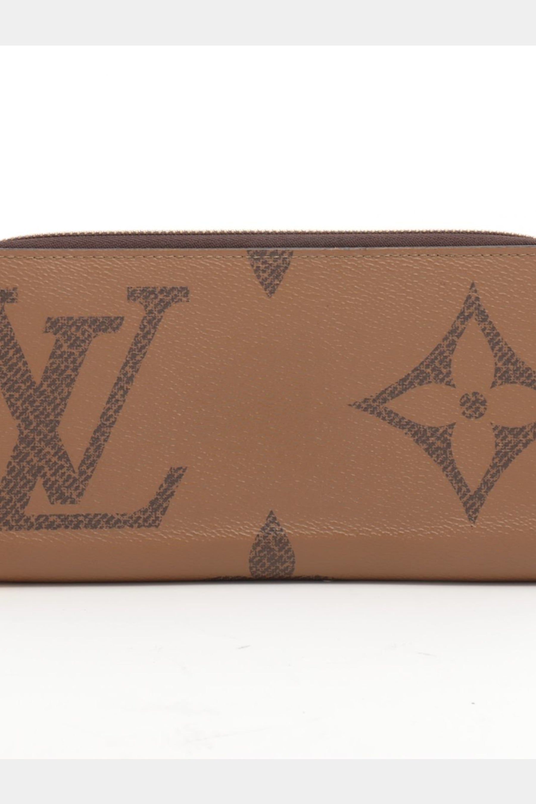 Giant Monogram Reverse Zippy Wallet sold by Lord & Taylor