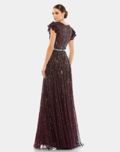 Sequined Wrap Over Ruffled Cap Sleeve Gown sold by Lord & Taylor
