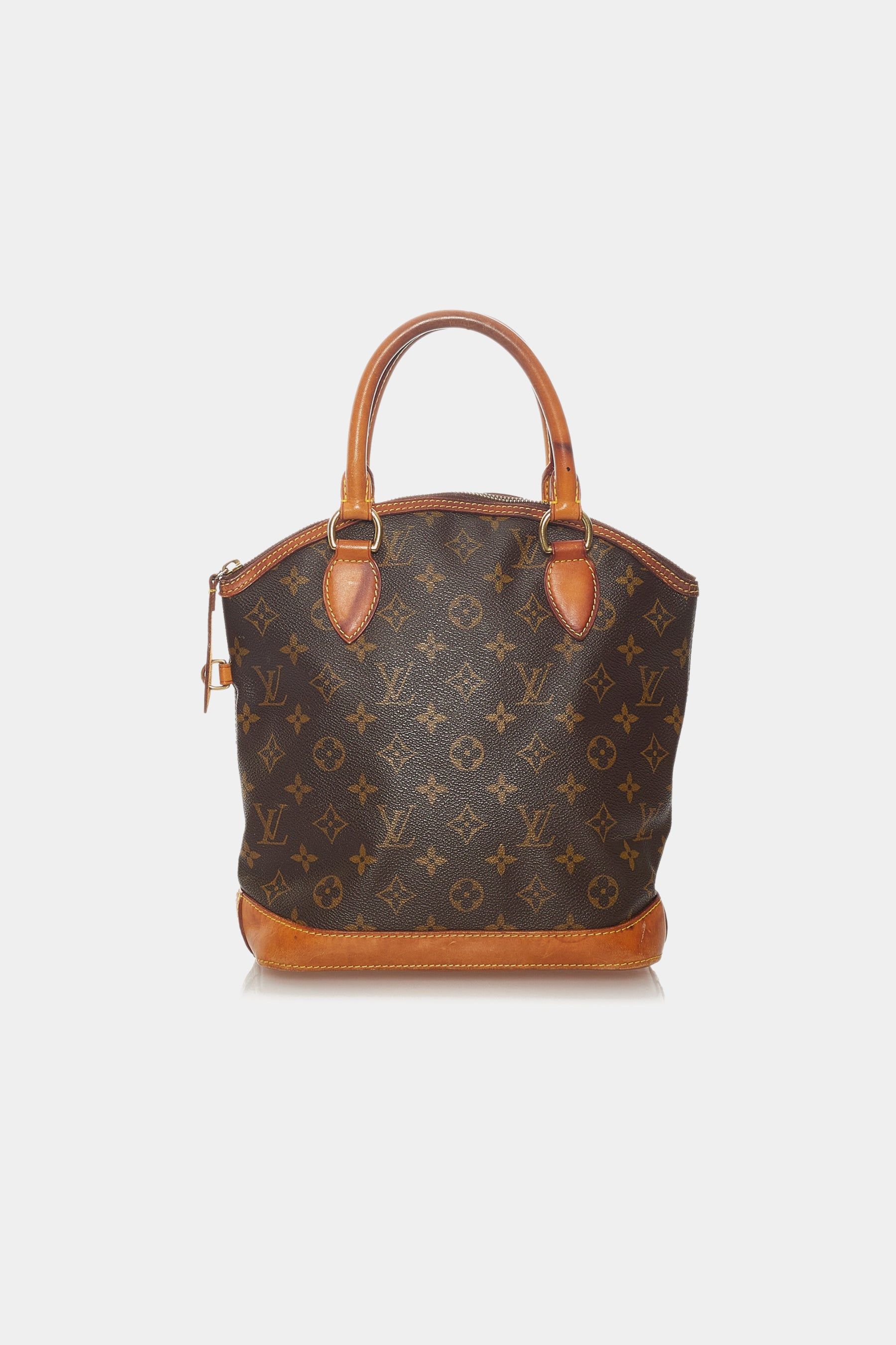 Lockit Vertical Handbag sold by Lord & Taylor