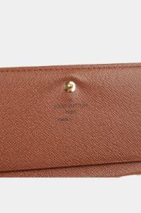 Tresor Monogram Wallet sold by Lord & Taylor