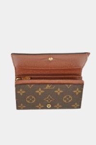 Tresor Monogram Wallet sold by Lord & Taylor