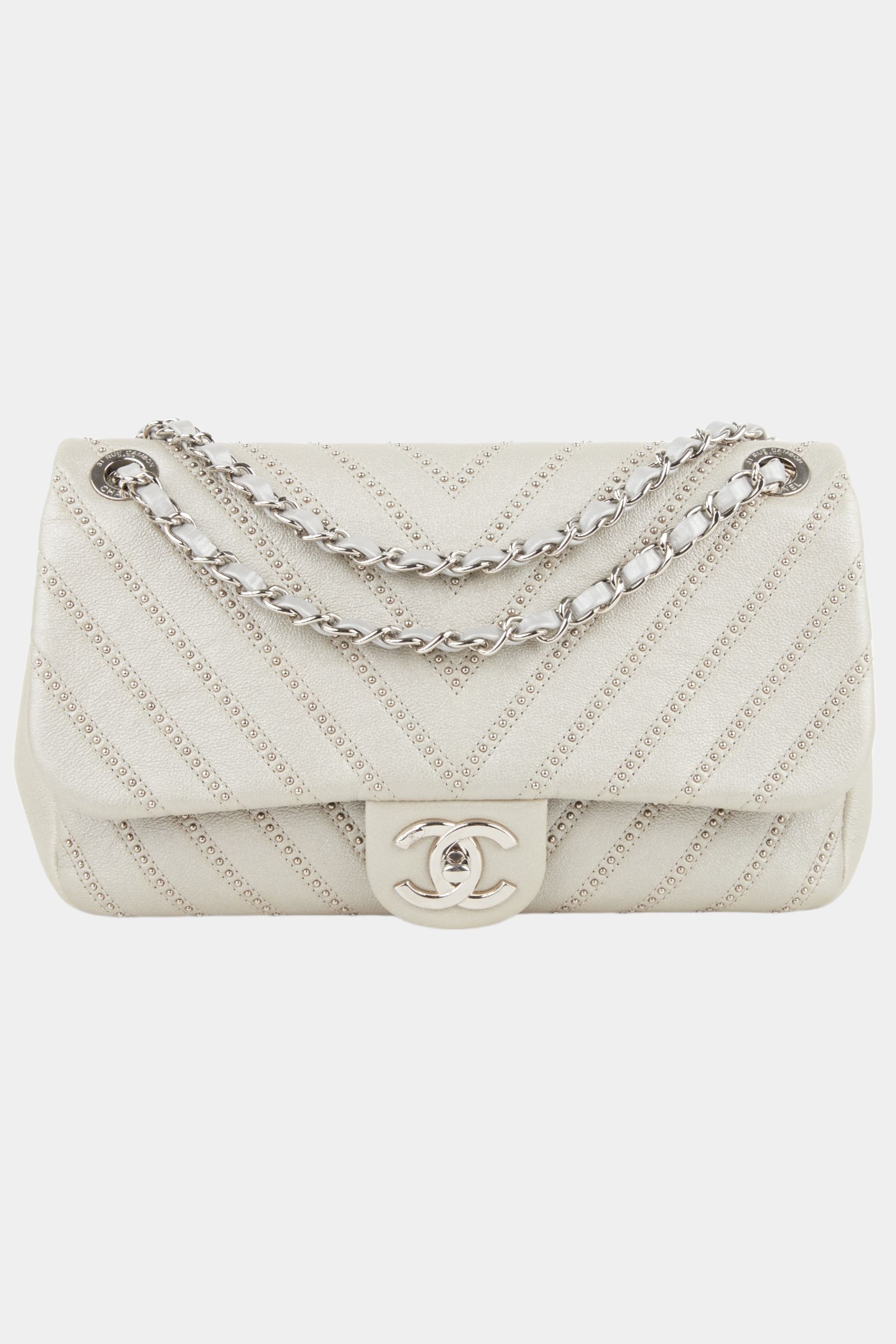 Studded Chevron Flap Bag sold by Lord & Taylor