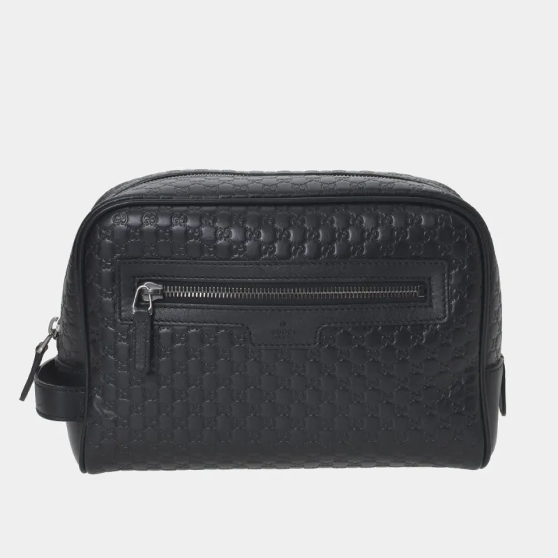 Microguccissima Pouch sold by Lord & Taylor