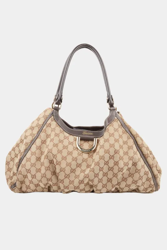 GG Canvas D-Gold Shoulder Bag sold by Lord & Taylor