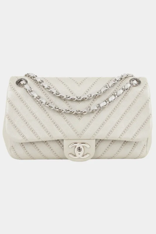 Studded Chevron Flap Bag sold by Lord & Taylor