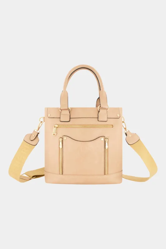 Crossbody Horseshoe Zipper Pull Handbag sold by Lord & Taylor