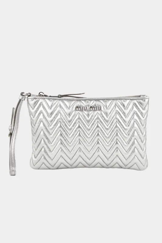 Logo Detail Clutch sold by Lord & Taylor