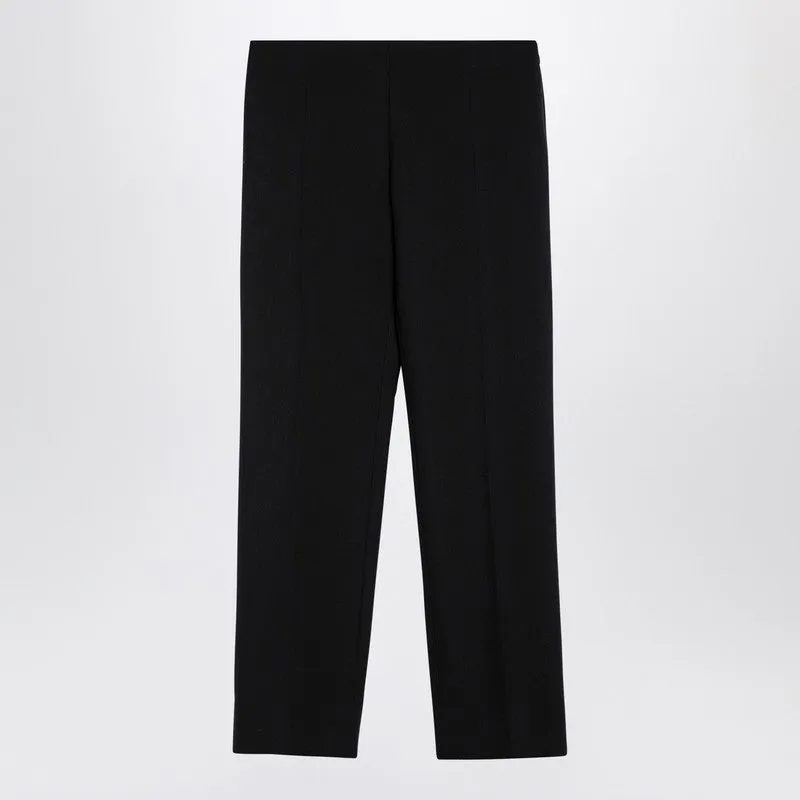 The Row Black wool trousers sold by Lord & Taylor