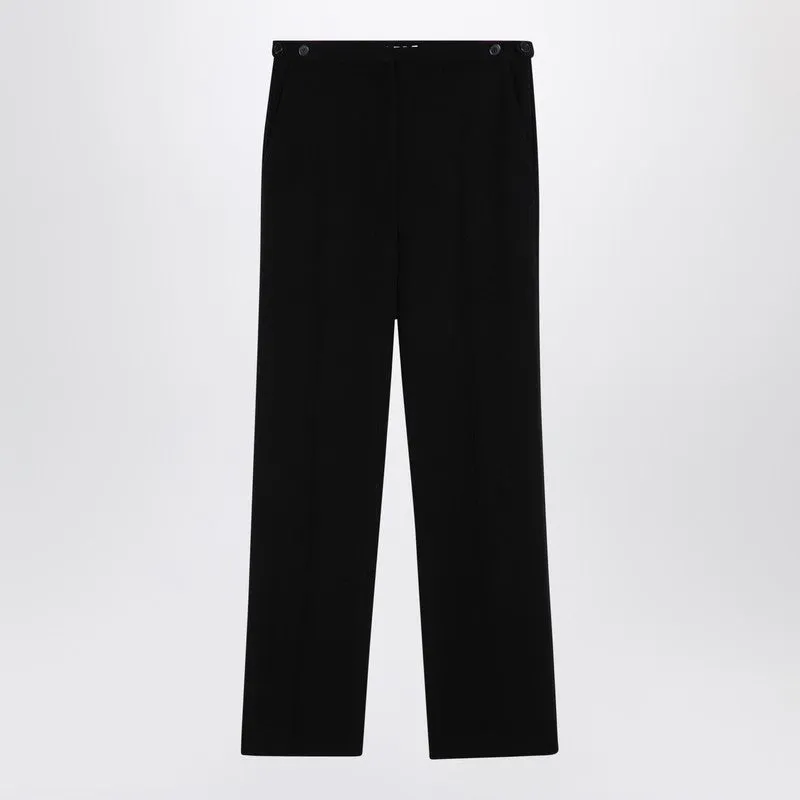 The Row Black wool trousers sold by Lord & Taylor