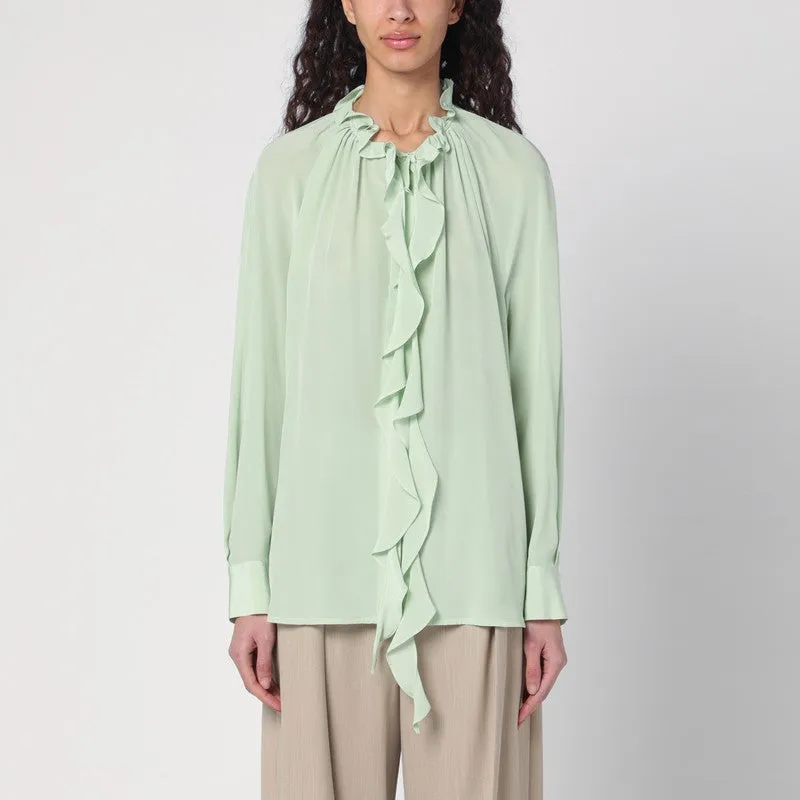 Victoria Beckham Light green shirt with ruffles sold by Lord & Taylor