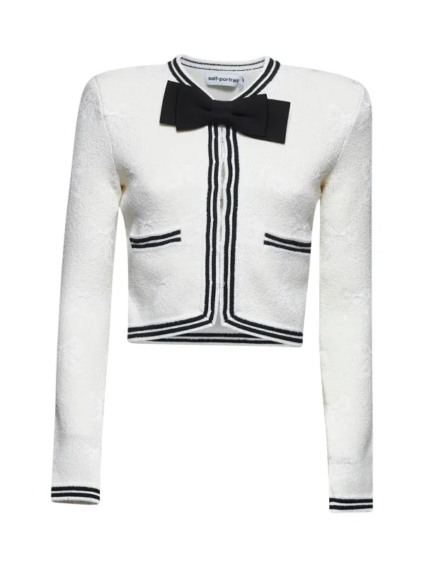 Ivory bow jacquard knit cardigan sold by Lord & Taylor