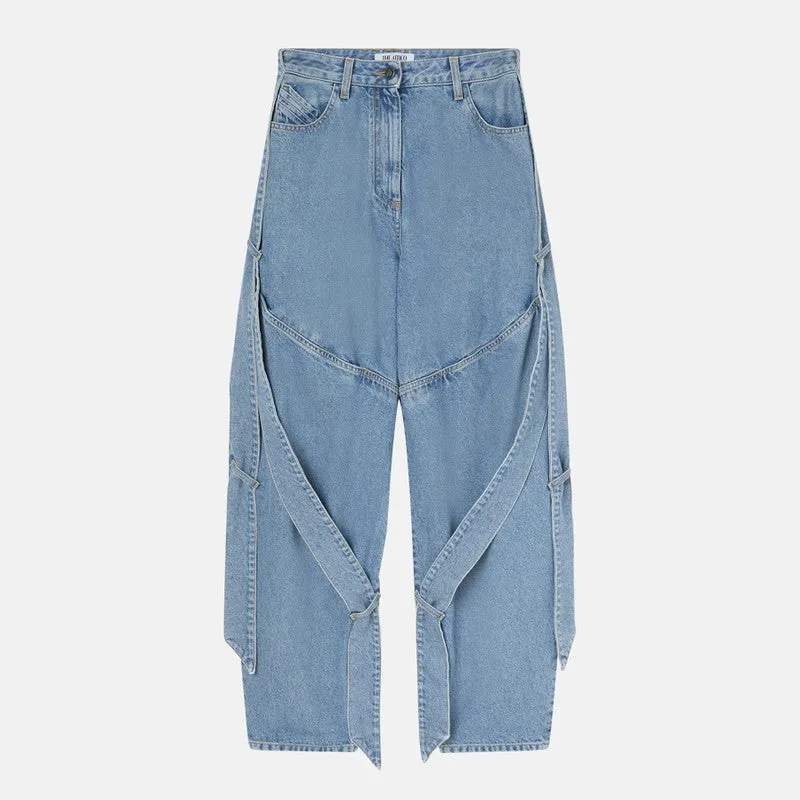 Wide light blue jeans with ribbons made by The Attico