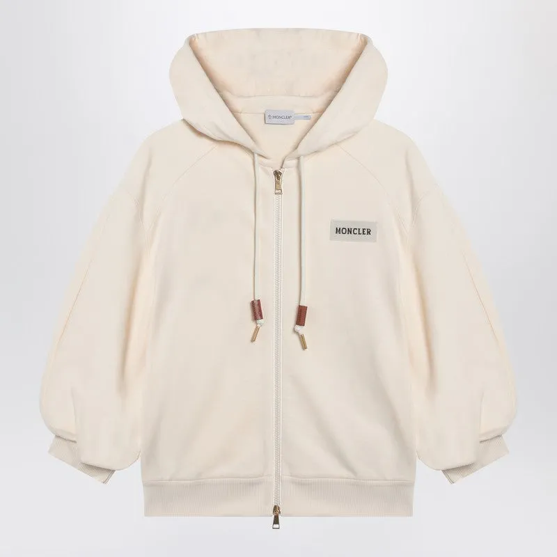 Cream-colored zip-up sweatshirt sold by Lord & Taylor