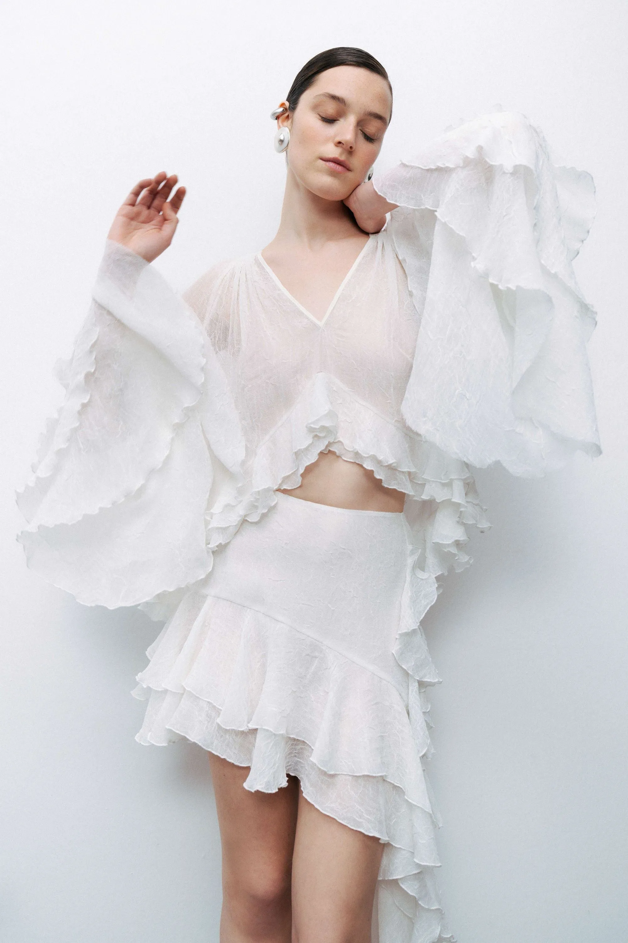 Ecru Ruffled Detail Asymmetric Mini Skirt sold by Lord & Taylor