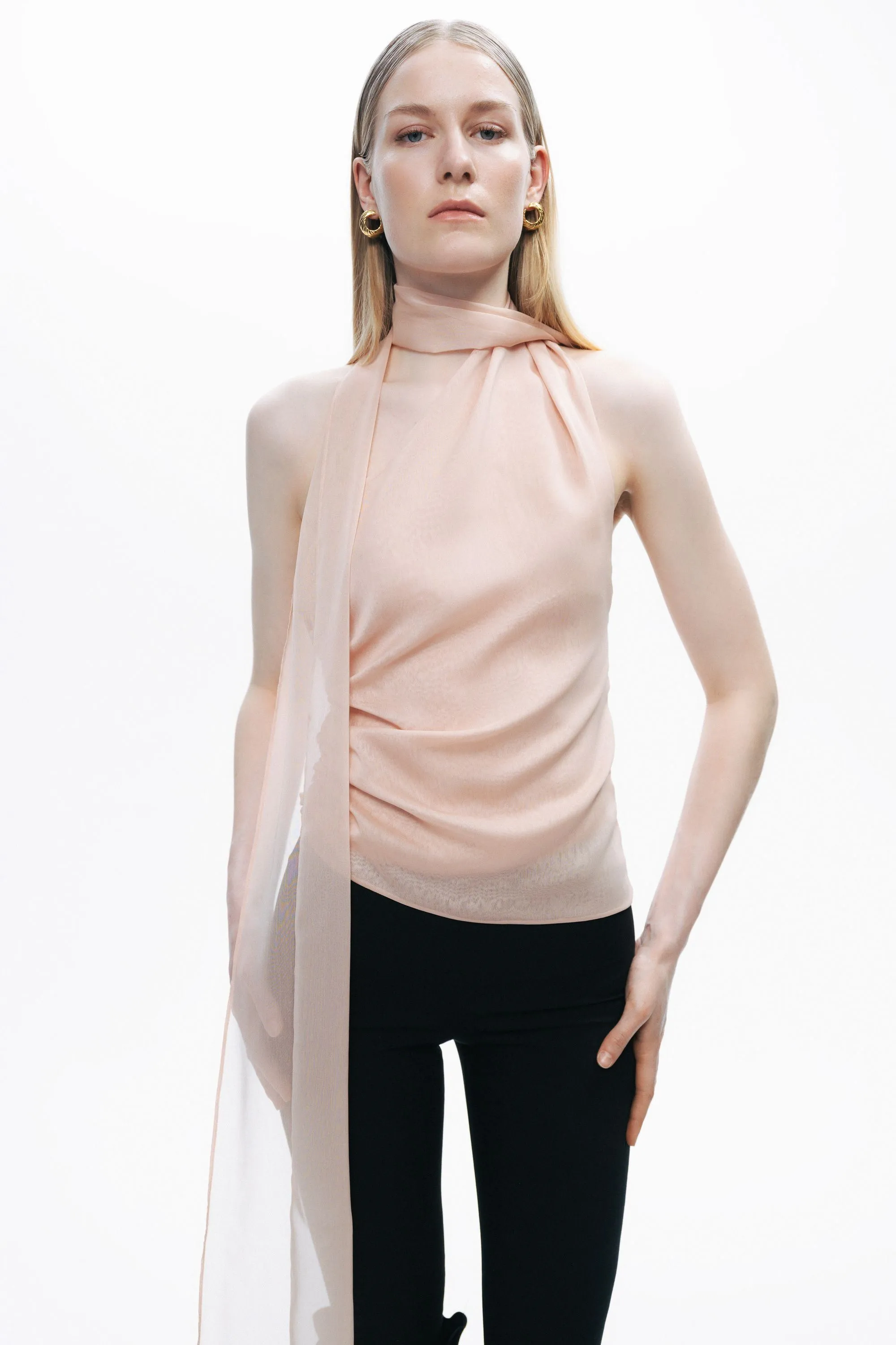 Powder Shawl-Inspired Open Back Blouse sold by Lord & Taylor