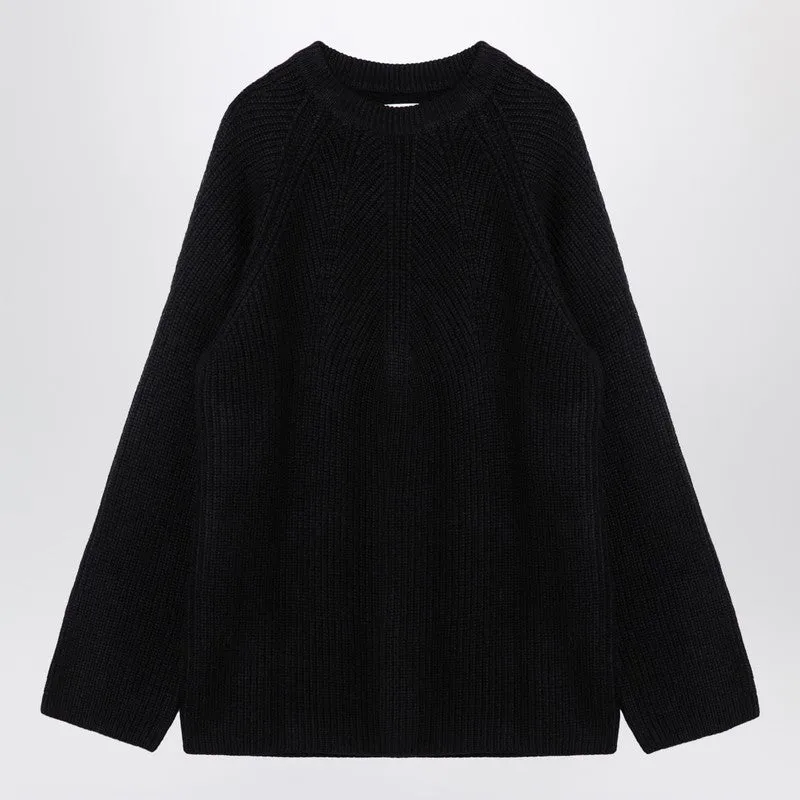 Black cashmere pullover sold by Lord & Taylor