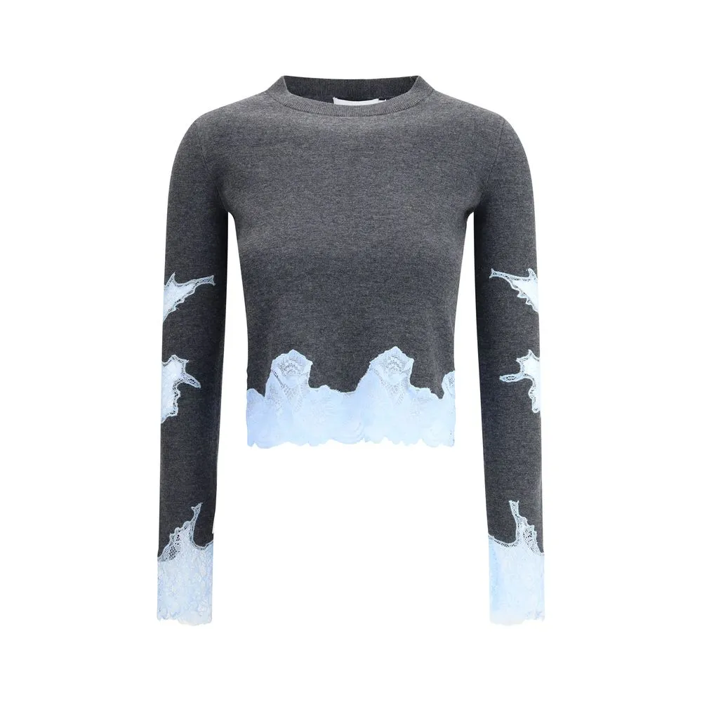 Laces inserts Sweater sold by Lord & Taylor