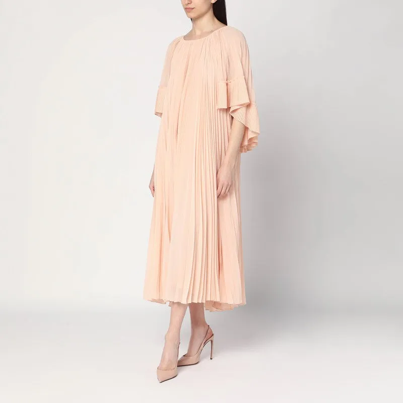 Pleated peach-colored midi dress sold by Lord & Taylor