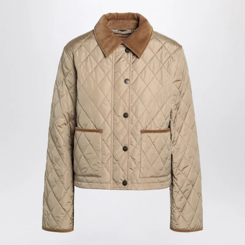 Cropped beige quilted nylon jacket sold by Lord & Taylor