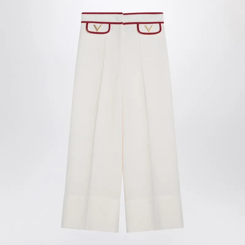 Ivory trousers with Gold V sold by Lord & Taylor