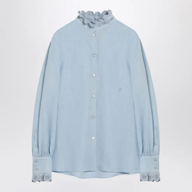 Light blue linen shirt with ruffles sold by Lord & Taylor