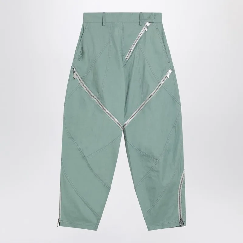 Sage green trousers with zip made by The Attico