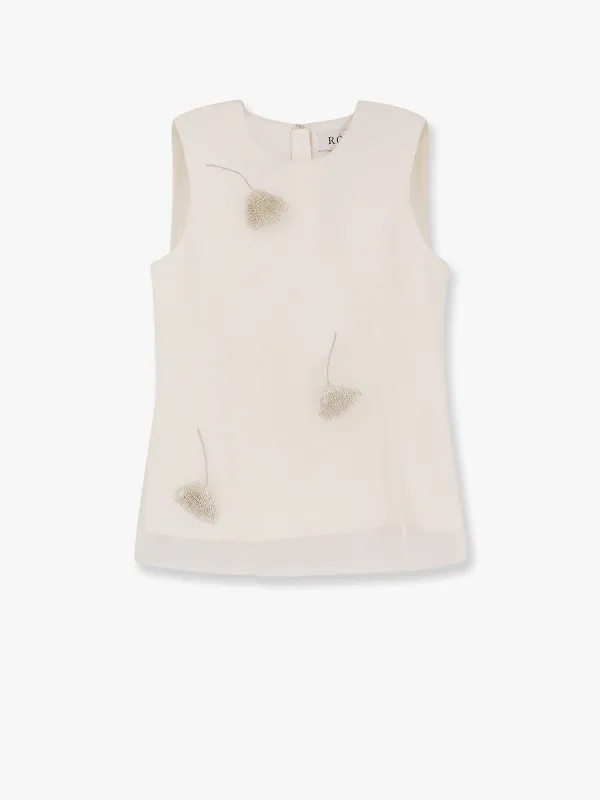 Silk top with jewel details sold by Lord & Taylor