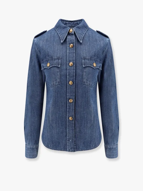 Denim shirt with vlogo buttons sold by Lord & Taylor