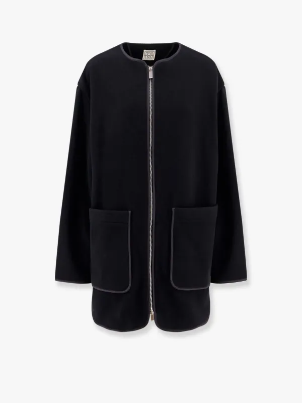 Wool blend coat with lateral slits sold by Lord & Taylor