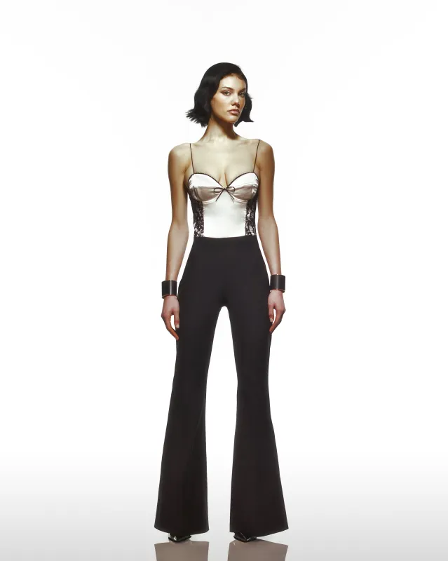 Corsetted Jump Suit With Satin And See Through Bustiyer sold by Lord & Taylor