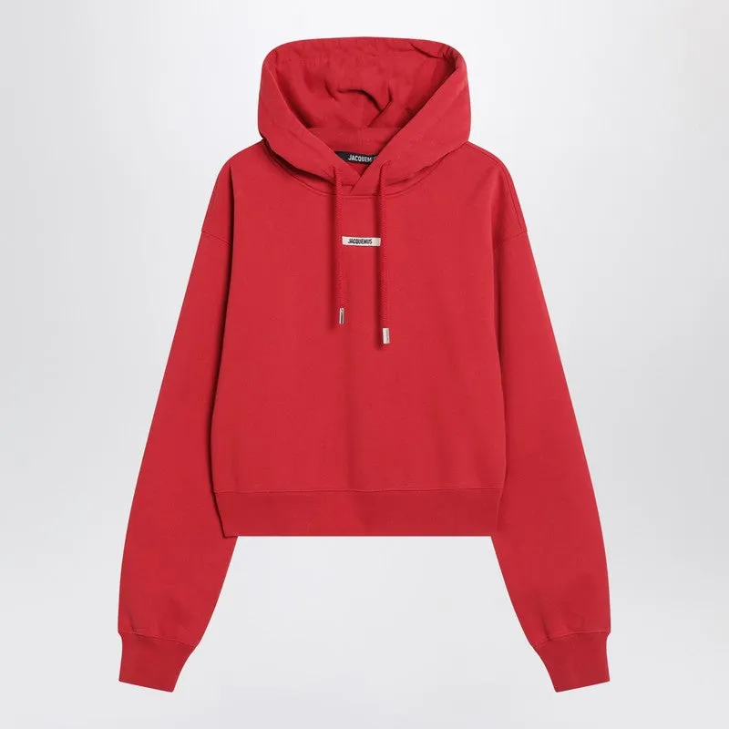 JACQUEMUS Red hoodie with logo patch sold by Lord & Taylor