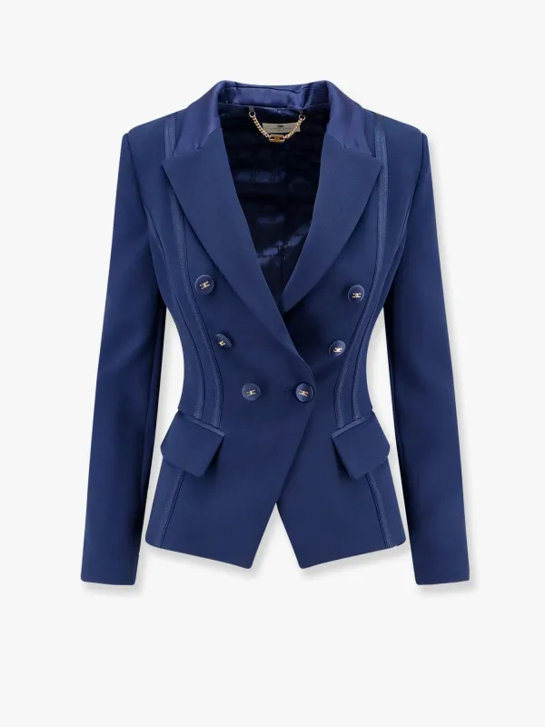 Essentials blazer with shoulder pads and covered buttons sold by Lord & Taylor