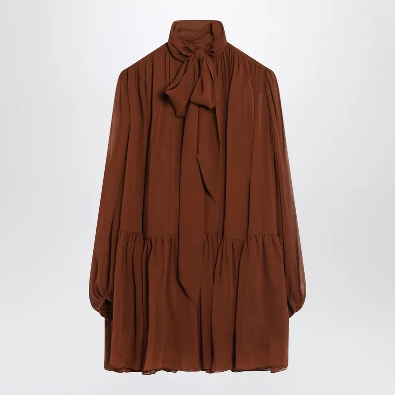 Saint Laurent Rust-colored lavallière silk dress sold by Lord & Taylor