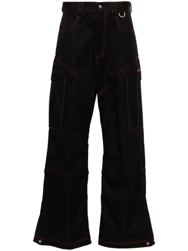 OFF-WHITE CARGO PANTS IN BLACK COTTON. 
WIDE FIT.
ZIP AND SNAP CLOSURE. 
VELCRO SIDE POCKETS. 
RED TOPSTITCHING. 
EMBROIDERED OFF-WHITE LOGO IN RED. 
ADJUSTABLE BOTTOM WITH PRESS STUDS. 
MADE sold by Lord & Taylor