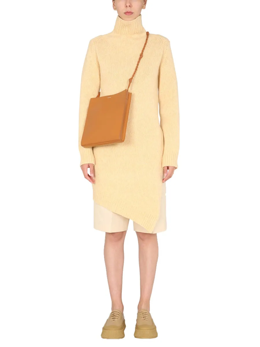 LONG ASYMMETRIC SWEATER sold by Lord & Taylor