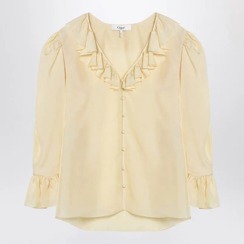 LIGHT YELLOW BLOUSE WITH RUFFLES IN SILK sold by Lord & Taylor