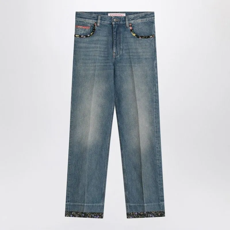 WASHED BLUE JEANS WITH FLORAL FABRIC TRIMS sold by Lord & Taylor