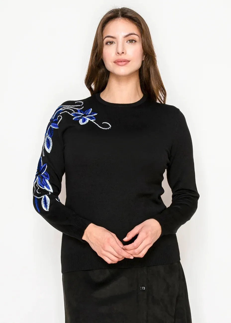Black Sweater with Blue Flowers sold by Lord & Taylor